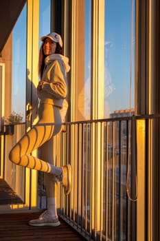 Woman in a balcony in a passive house in Aragon