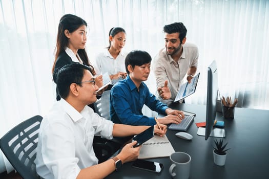 Group of diverse office worker employee working together on strategic business marketing planning in corporate office room. Positive teamwork in business workplace concept. Prudent