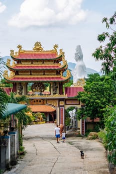 Father and son tourists walking in Vietnam Buddhist Temple, happy childhood, exploring world.