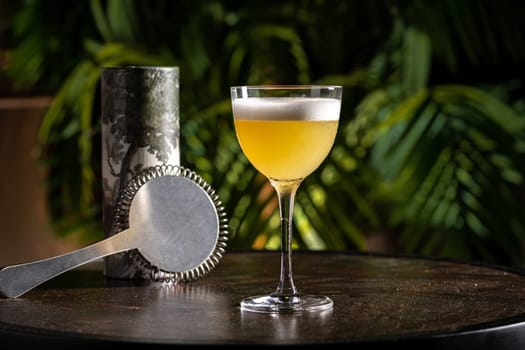 Luxury cocktail on the wooden table on a dark background