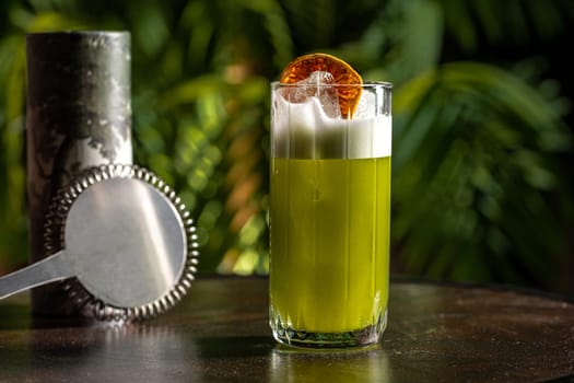 Luxury cocktail on the wooden table on a dark background