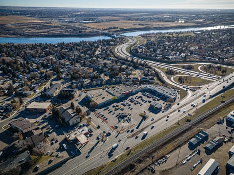 Drone image capturing the charm of River Heights, Saskatoon, with its lush landscapes and residential areas.