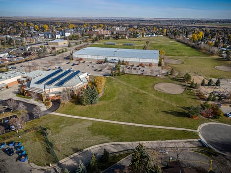 Drone image capturing the charm of River Heights, Saskatoon, with its lush landscapes and residential areas.