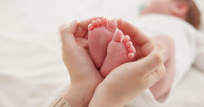 Feet, hands and mother with baby, love and support for care, health and wellness in bedroom. Closeup, family or mama with an infant, protection and child development with bonding or maternity in home.