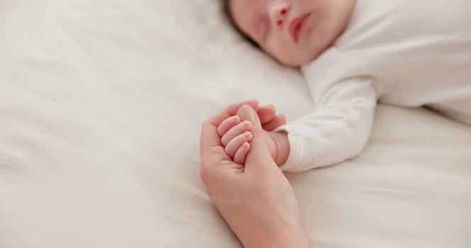 Sleeping, holding hands or mother with infant, love or support for care, health or wellness at home. Fingers, family or mama with a healthy baby, protection or child development for bond or maternity.