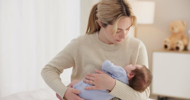Mother, baby and nap with love, care and support for newborn in nursery with sleep. Young child, mom and family with youth and childcare with bonding and maternity in a home with infant and rocking.