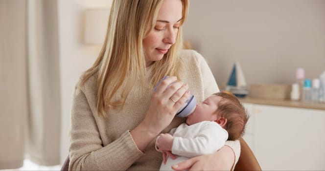 Milk, bottle and a mother feeding her baby in a bedroom of their home together for love, growth or care. Family, nutrition or formula and a newborn infant drinking with a woman parent in apartment.