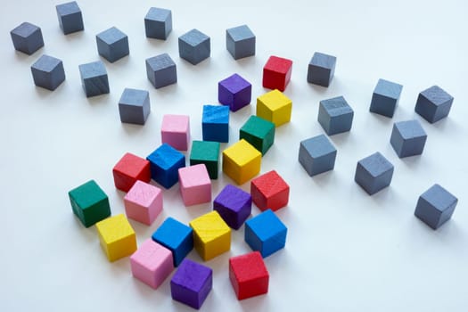 Gray and multi-colored cubes as symbol of diversity and the fight for equal rights.
