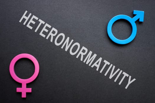 Male and female signs and word heteronormativity.
