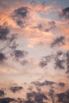 Vertical shot of bright vibrant clouds in evening sky