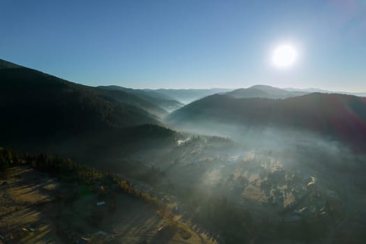 Interplay of mist and mountains in early hours created stunning natural vista. Misty embrace of mountains gave forest dreamlike quality.