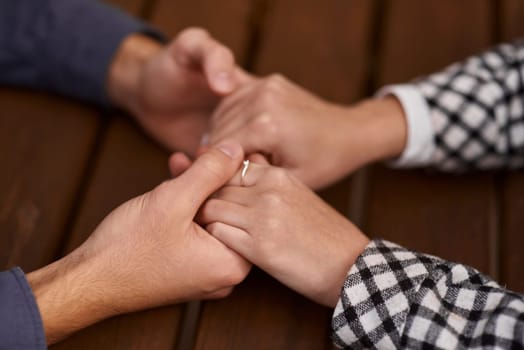 Close-Up: Loving Couple's Hands on the Table. intimacy, love and connection, emotional closeness, relationship details, tender touch, romantic moments, couple goals