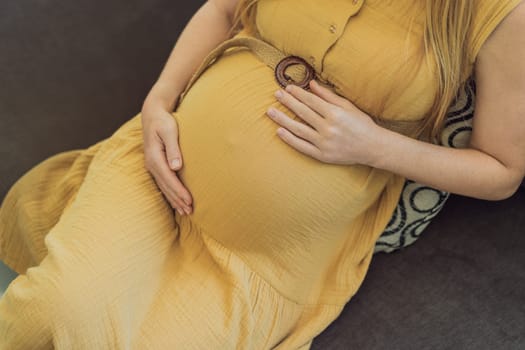 Expectant woman experiences discomfort, feeling unwell during pregnancy.