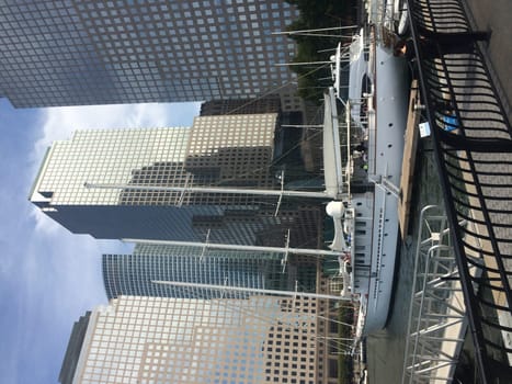 Yacht in the Water in Front of New York City Skyscrapers. High quality photo