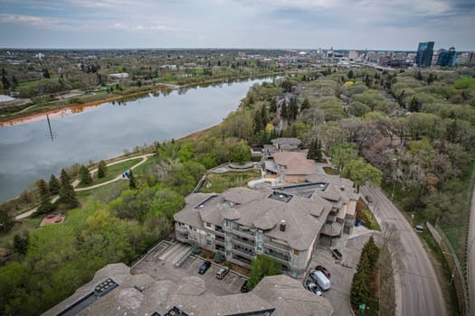 Drone image showcasing the charm of Nutana, Saskatoon, with its residential areas, greenery, and community spaces