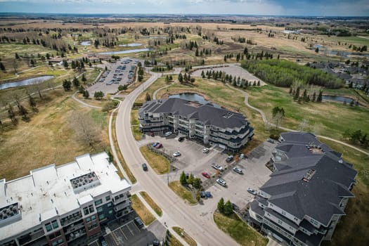 Drone image of The Willows, Saskatoon, highlighting its luxury homes and golf course.