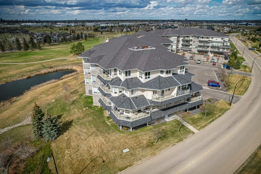 Drone image of The Willows, Saskatoon, highlighting its luxury homes and golf course.