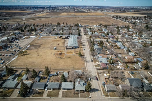 Overhead drone image of Sutherland, Saskatoon, highlighting its unique community layout and residential areas.