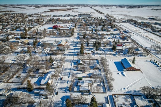 Drone image capturing the town of Dalmeny in Saskatchewan, showcasing its charming suburban setting and community atmosphere.