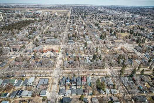 Drone image showcasing the charm of Nutana, Saskatoon, with its residential areas, greenery, and community spaces