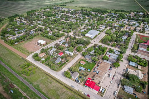 Drone image capturing the town of Dalmeny in Saskatchewan during the summer season, showcasing its vibrant greenery and serene atmosphere