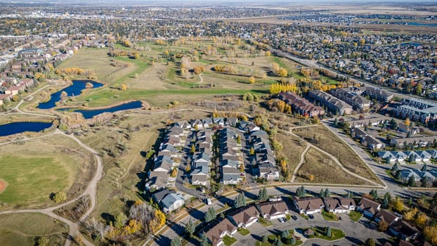 Drone image capturing Wildwood, Saskatoon, with its lush parks and residential charm.