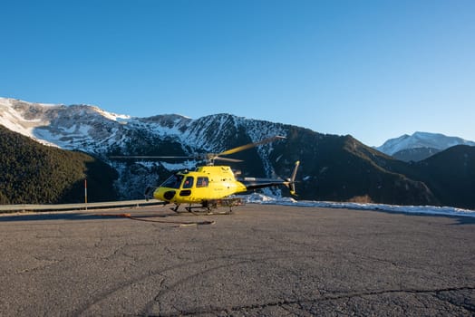 Arinsal, Andorra: 2024 January 21: Rescue helicopter at the 2024 Ski Mountaineering World Cup at the Pal - Arinsal ski resort in 2024.