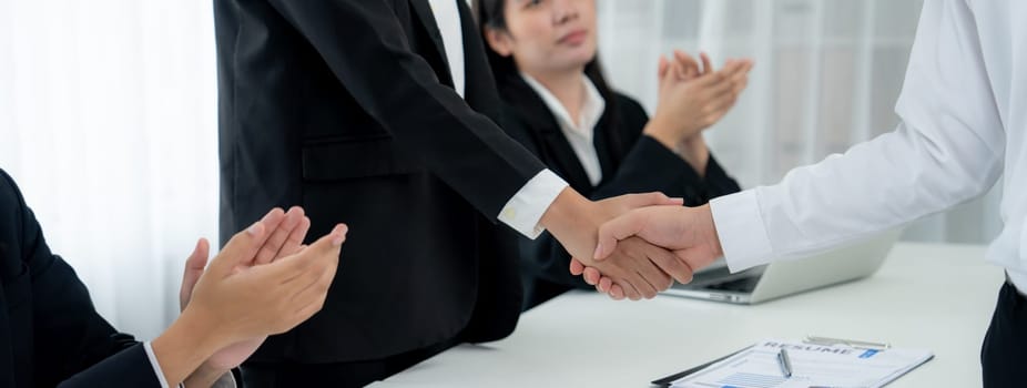 Business people group handshake at meeting table. Job interview success or making successful business oratory agreement