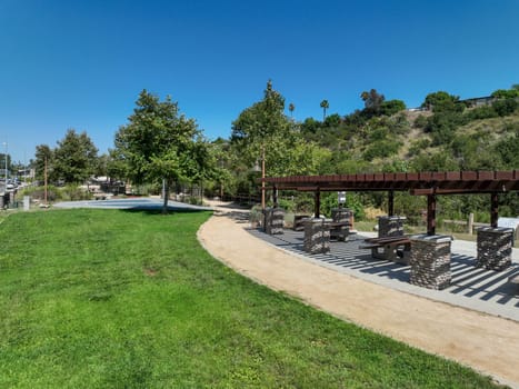 Recreational facilities with table and barbecue in residential community park in San Diego, California, USA