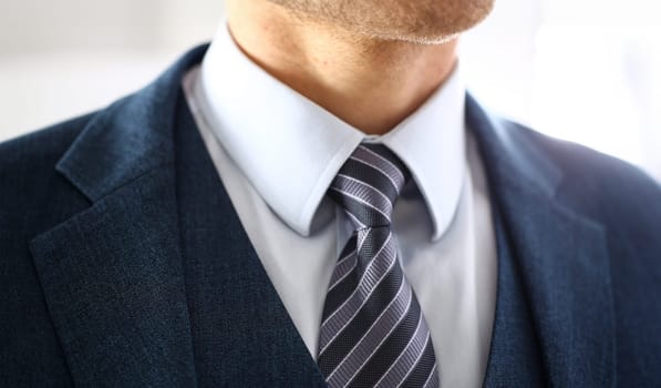 Male arm in blue suit set tie closeup. White collar management job serious move secretary student luxury formal interview executive agent marriage store corporate elegance employment preparation