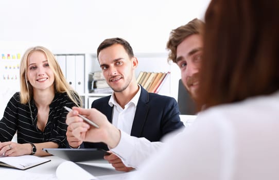 Group of people deliberate on white board problem in office closeup. Graph consult idea participate creative talk review situation job document explain council train successful decision concept