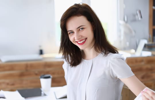 Beautiful smiling businesswoman portrait at workplace look in camera. White collar worker at workspace exchange market job offer certified public accountant internal revenue officer concept