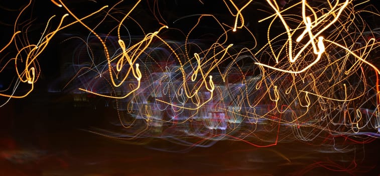 Abstract background lights of a night city as a drunk man sees a driver all moving chaotically depicting loops