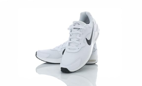 MINSK, BELARUS studio shot - DECEMBER 26, 2017 : NIKE DOWNSHIFTER sport shoe, isolated on white background, product shot. Nike is American multinational corporation founded on January 25, 1964.