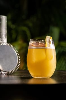 Luxury cocktail on the wooden table on a dark background