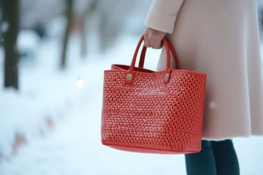 Woman in winter wear holds red shopping bag. Generative AI.