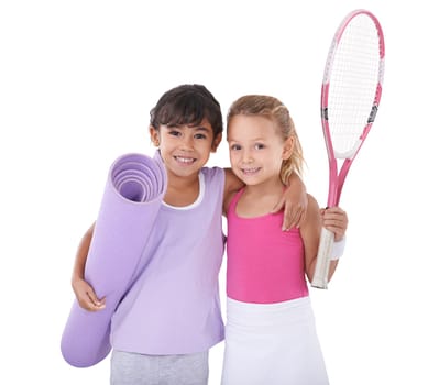 Tennis, sports and portrait of kids hug on a white background for training, workout and exercise. Fitness, happy friends and isolated children with yoga mat, racket and equipment for hobby in studio.