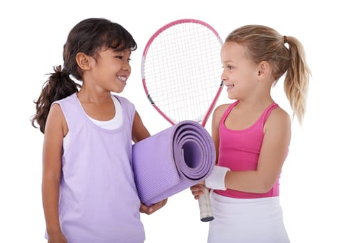 Tennis, happy and children on a white background for sports training, workout and exercise. Fitness, friends and isolated young kids with yoga mat, racket and gym equipment for hobby in studio.