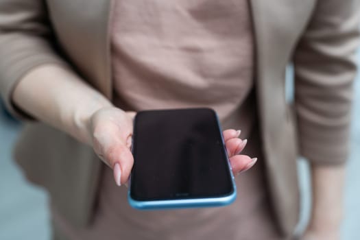 business woman touching the mobile phone. High quality photo