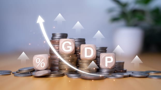 Gross domestic product, Financial, Management, Economic, Inflation, recession and Money concepts, GDP block with Coins stack and UP and Down arrow symbol icon. 