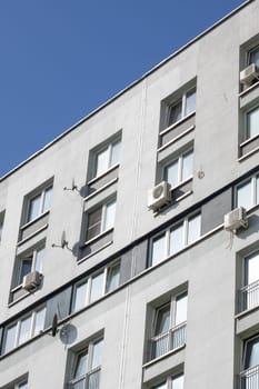 Air conditioners on the wall of a tall building