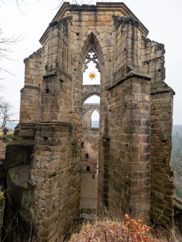 The ruins of Oybin in the mist.. The temple and burg  founded as Celestines monastery in 1369 in the Zittau Mountains on the border of Germany Saxony with the Czech Republic
