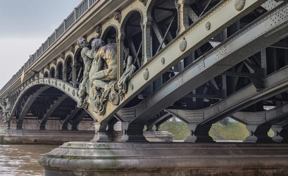 France, Paris - Jan 04, 2024 - Detail of Sculptures decorating the two level bridge Bir Akime (Pont de Bir-Hakeim steel bridge) across the Seine River in Paris. Destinations in Europe. Space for text, Selective focus.