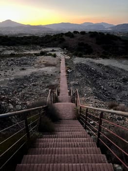 Stairs leading down to the mountains. High quality photo