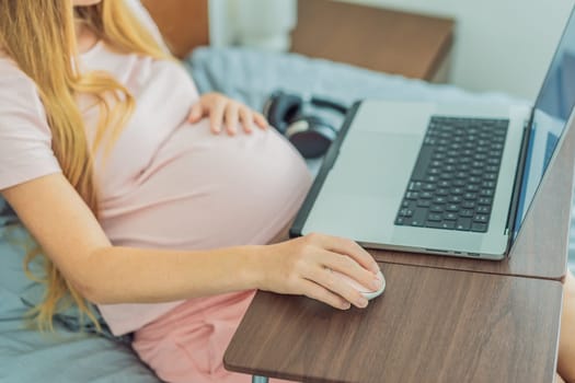 Pregnant woman working on laptop. Expectant woman efficiently works from home during pregnancy, blending professional commitment with maternal duties.