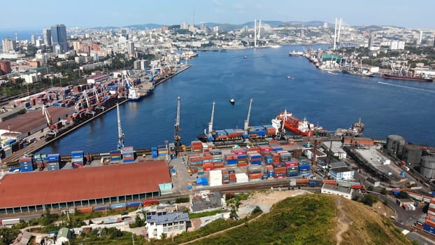 Top view. Vladivostok Commercial Sea Port. Industrial port with containers in Vladivostok