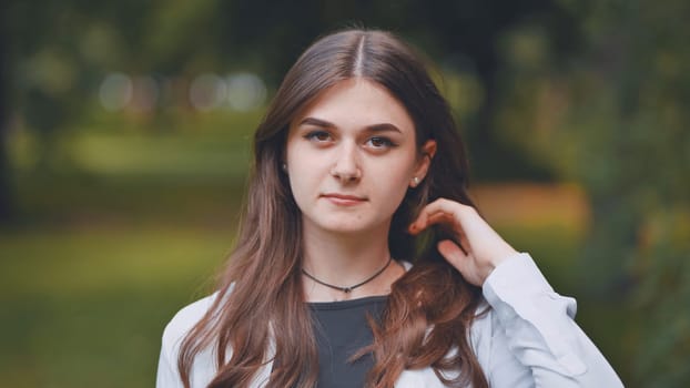 Portrait of a young Georgian girl in a park in summer