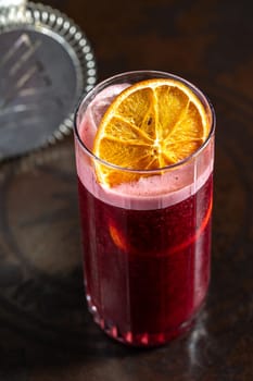 Luxury cocktail on the wooden table on a dark background