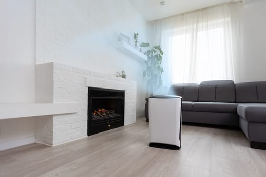 White Air purifier in living room for fresh air and healthy life. Copy space.