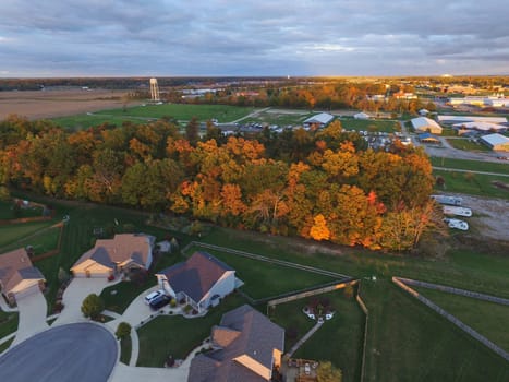 Aerial View of Tranquil Suburban Autumn Landscape in Fort Wayne, Indiana by Adam Klein